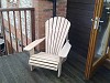 Oak Adirondack Chair on a south coast balcony