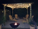 Classic Iroko Chairs in a Sevenoaks garden.