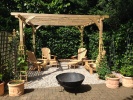 Classic Iroko Chairs in a Sevenoaks garden.