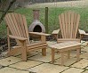 Two Classic Adirondacks with a coffee table in Iroko