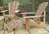 Two Classic Adirondacks with a footrest in Iroko