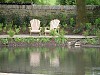 2 Classic Adirondack Chairs in an Oxfordshire garden