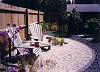 Adirondack Chairs in Iroko in a Cambridge city garden